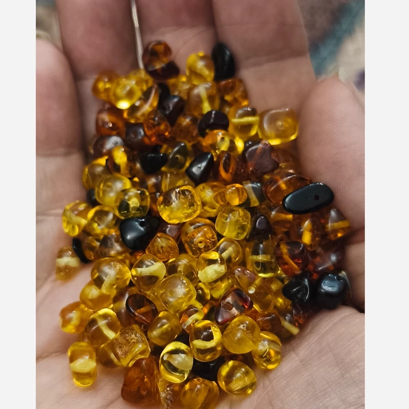 مهره سنگ کهربای نامنظم سوراخ دار سنگ اصل درجه یک طبیعی معدنی راف تراش نخورده دفرمه