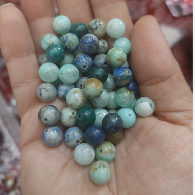 مهره سنگ کریزوکولا وارداتی از کنگوسوراخ دار سایز بین 7و8 میل سنگ طبیعی اصل