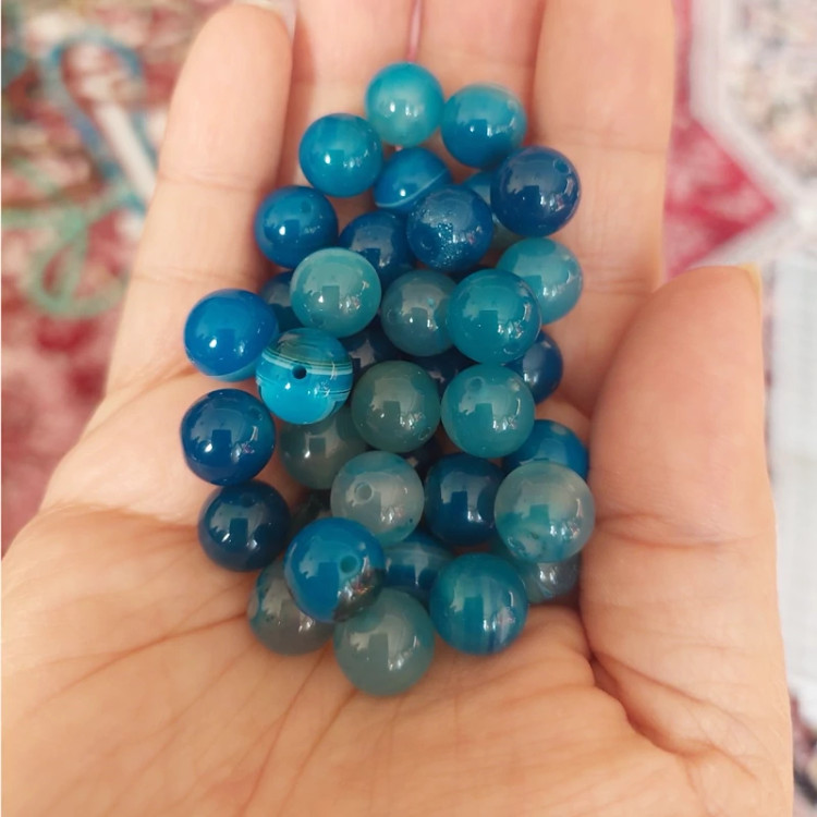 مهره عقیق ماداگاسکار آبی سایز 10 سوراخ دار سنگ اصل طبیعی گوی