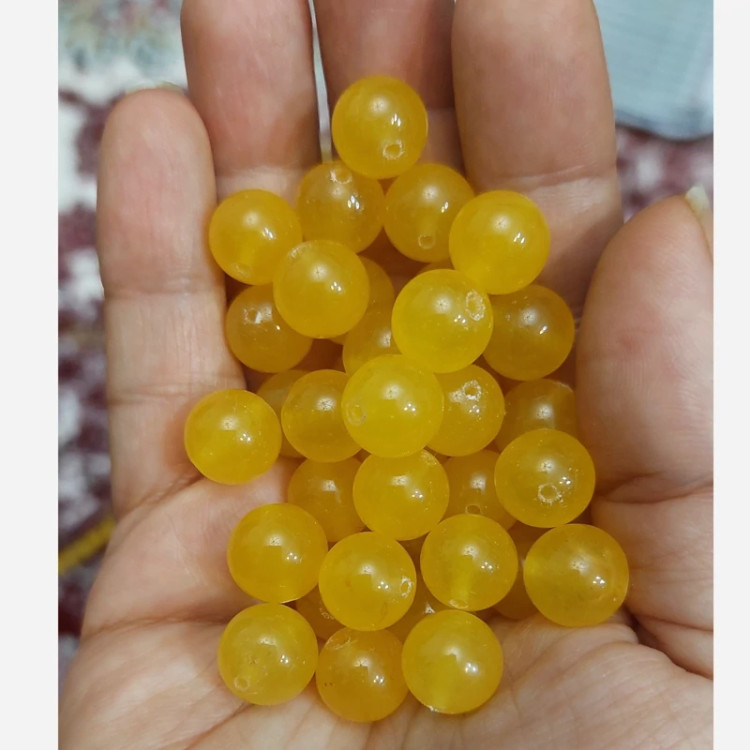 مهره سنگ جید زرد سایز 10 سوراخ دار سنگ اصل طبیعی