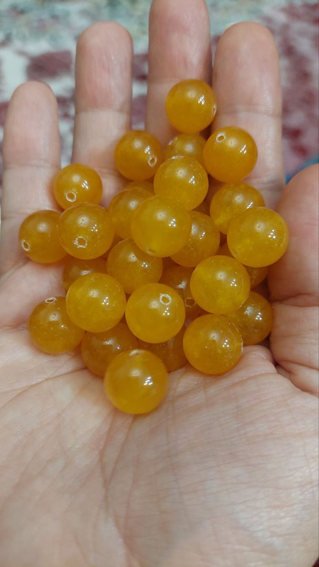 مهره سنگ جید زرد ۱۲میل طبیعی اصل سوراخ دار