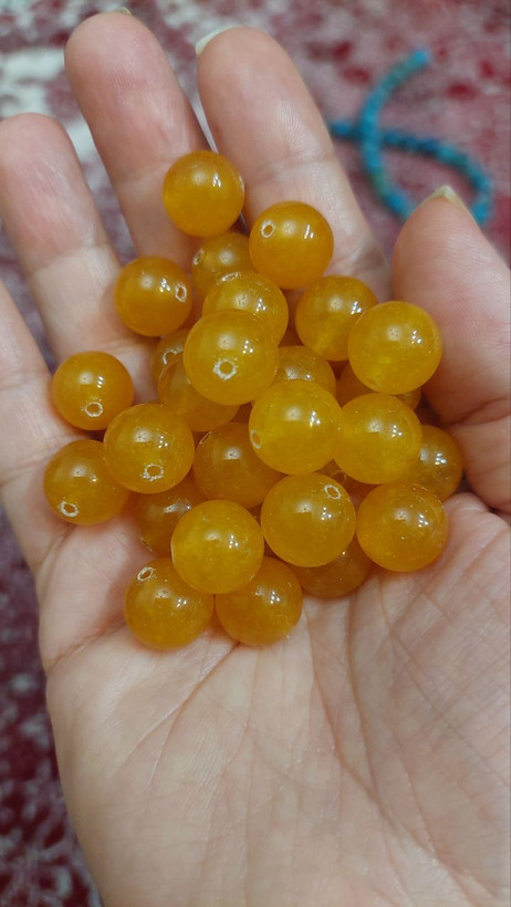 مهره سنگ جید زرد ۱۲میل طبیعی اصل سوراخ دار