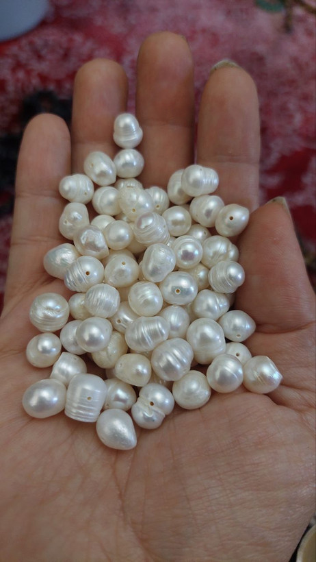 مروارید پرورشی اصل باروک سایز بین 7 و8 میل طبیعی سوراخ دار