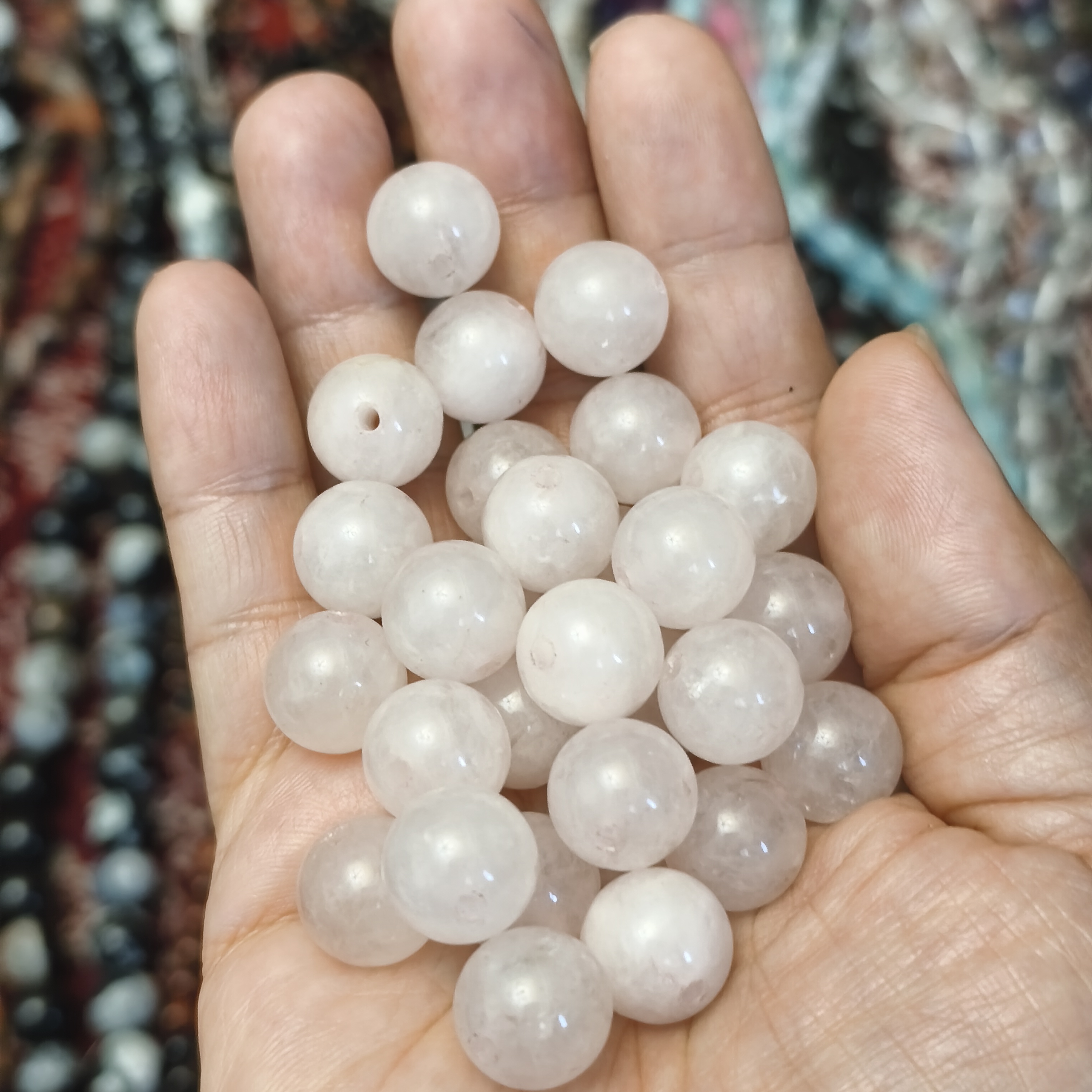 مهره رزکوارتز ماداگاسکار 12میل اصل معدنی سوراخ دار