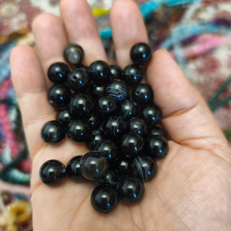 مهره عقیق سیاه ۱۰میل اصل معدنی سوراخ دار