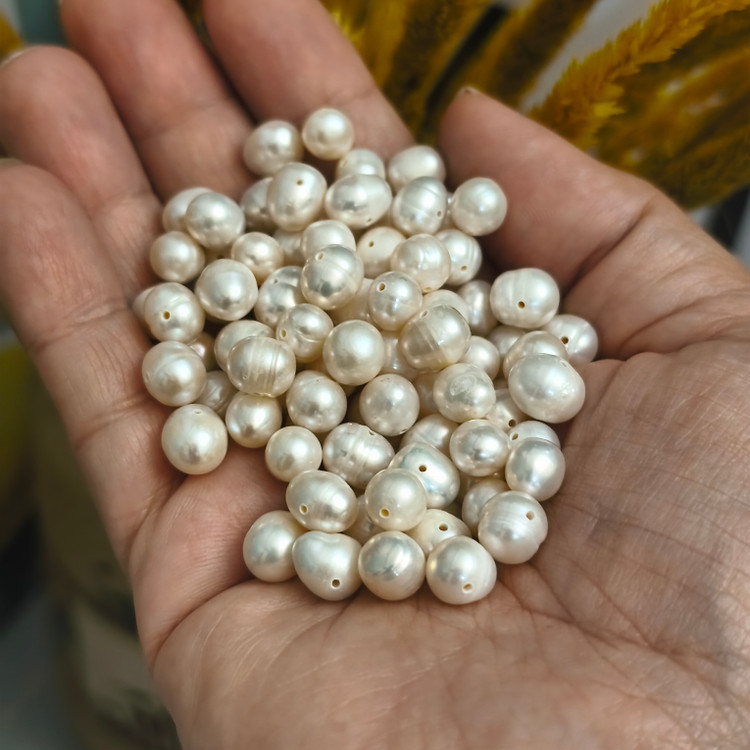 مروارید پرورشی اصل باروک سایز بین 7 و8 میل طبیعی سوراخ دار